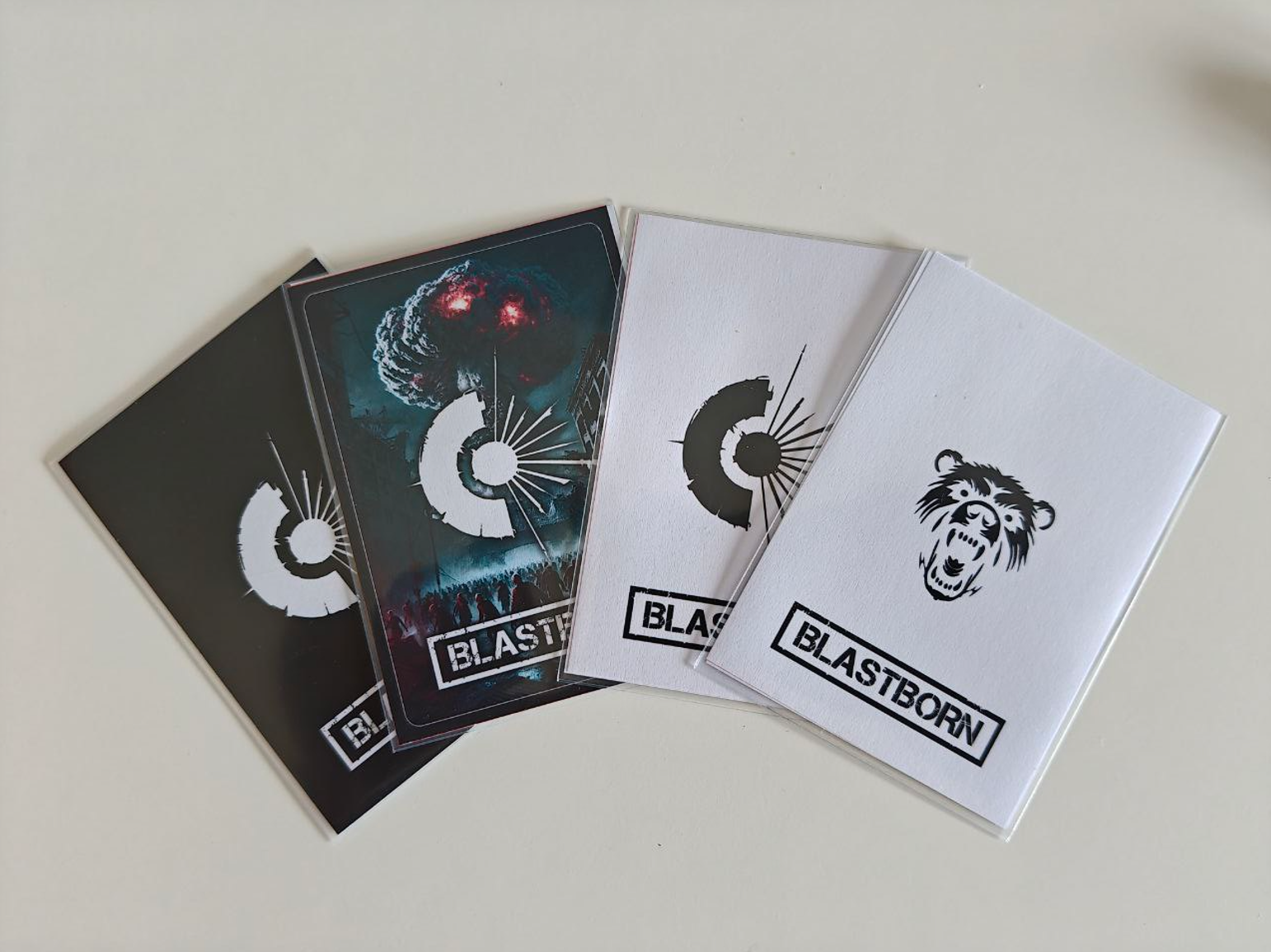 Front faces of the game cards, including white, black, coloured, and Gaia Wild faction designs